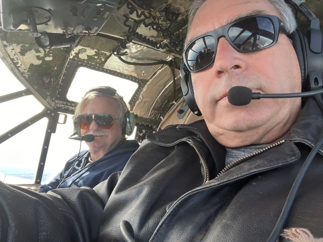 Museum Chief Pilot Mike Spalding flies the Beech home
